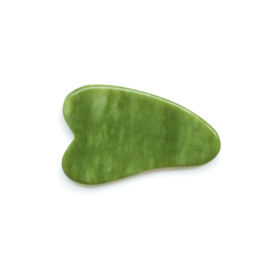 A green jade Gua sha massage tool with a smooth, polished curved surface, shown on a plain white background.